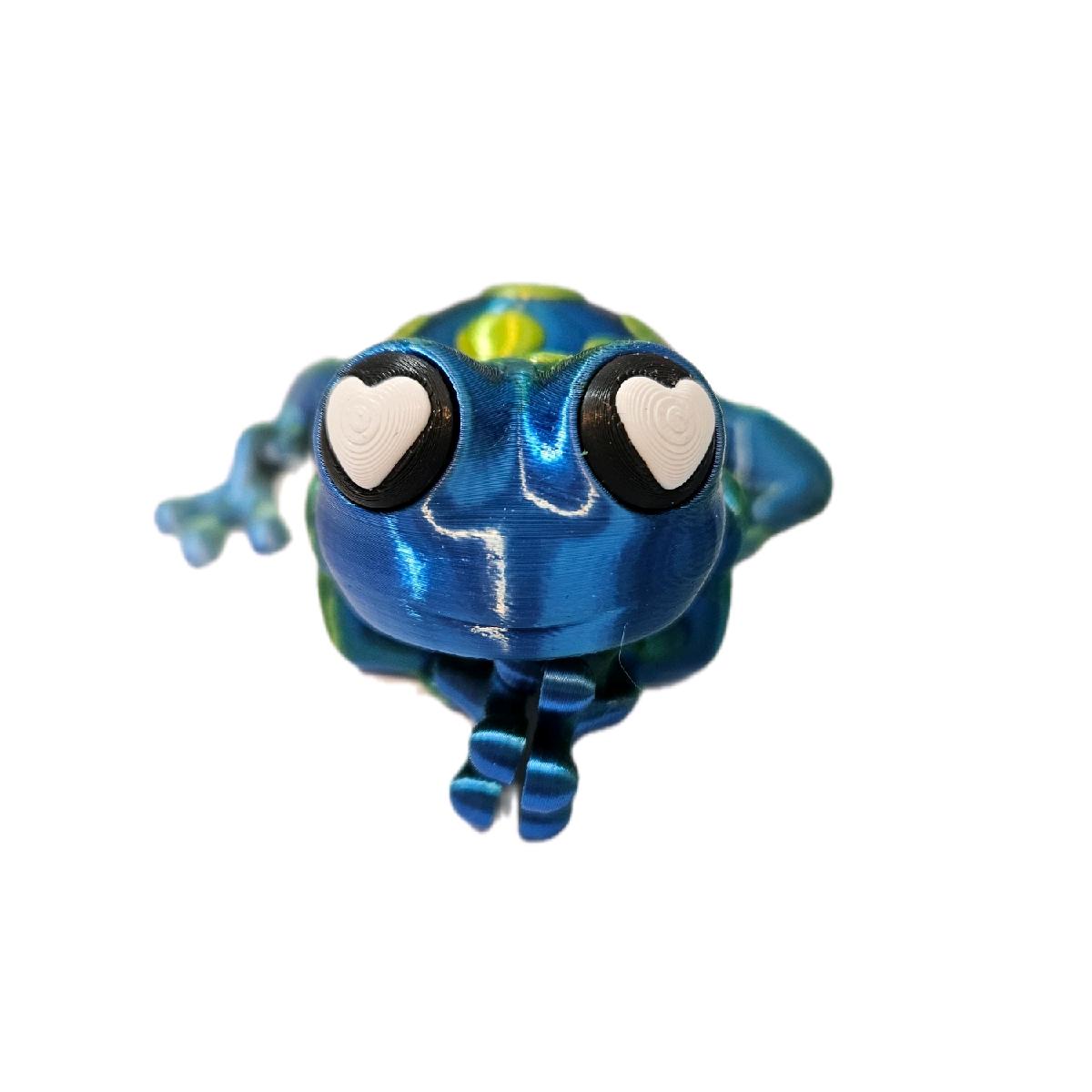 Flexi Frog, Blue and Green with Green and Yellow Spots. 3D Printed - A fully articulated 3D printed Flexi Frog in a vibrant blue and green multicolour finish. Flexible, durable, and perfect as a fidget toy, desk companion, or quirky gift, each frog features a unique colour pattern.