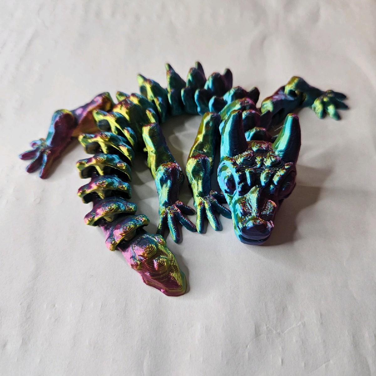 3D Articulated Baby Bull Dragon - Classic Toy Figure, ADHD/Autism, stress relief. fidgetstoys - Fully articulated multicolour baby bull dragon, 3D printed for fidgeting, sensory play, stress relief, and display. 🐉✨